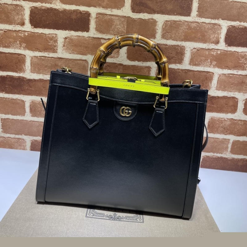 G*u*i top handle bags